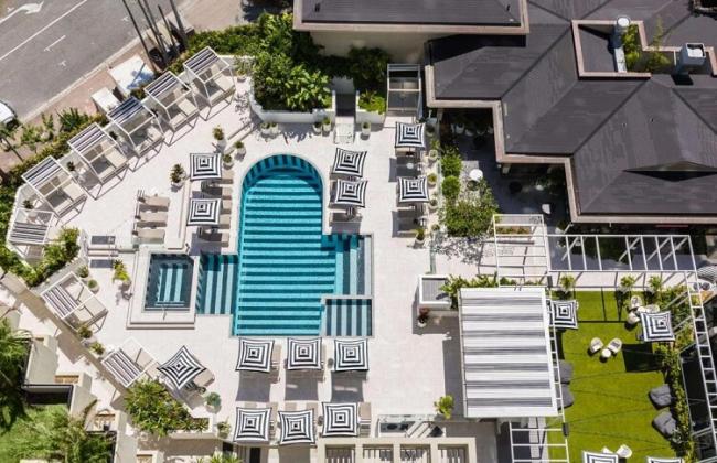 Aerial view of QT Gold Coast hotel pool area